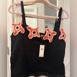 Anthropologie Black Knit cropped Top with Coral/ orange Accents. New with tags